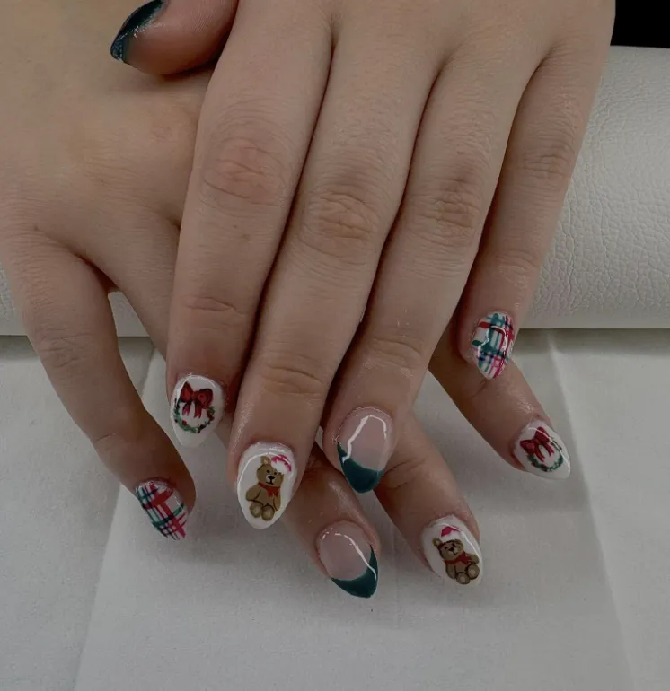 Holiday nails with plaid, bows and teddy bears